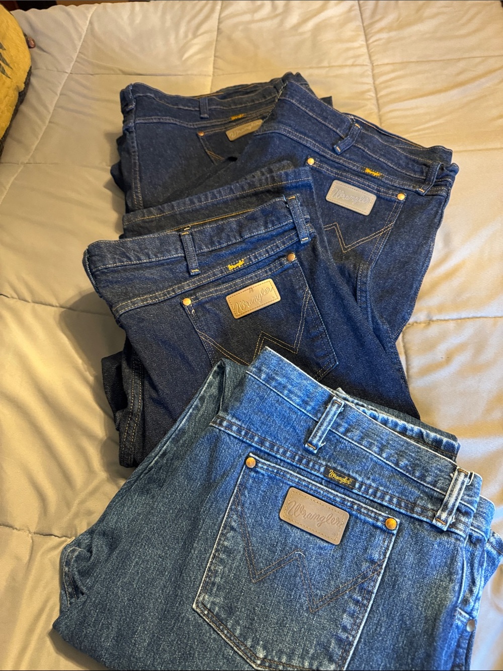 Wrangler Men’s Blue bootcut Jeans - 3 Dark & 1 light colored . Never worn.